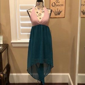 Beautiful high low dress size medium. Never worn.